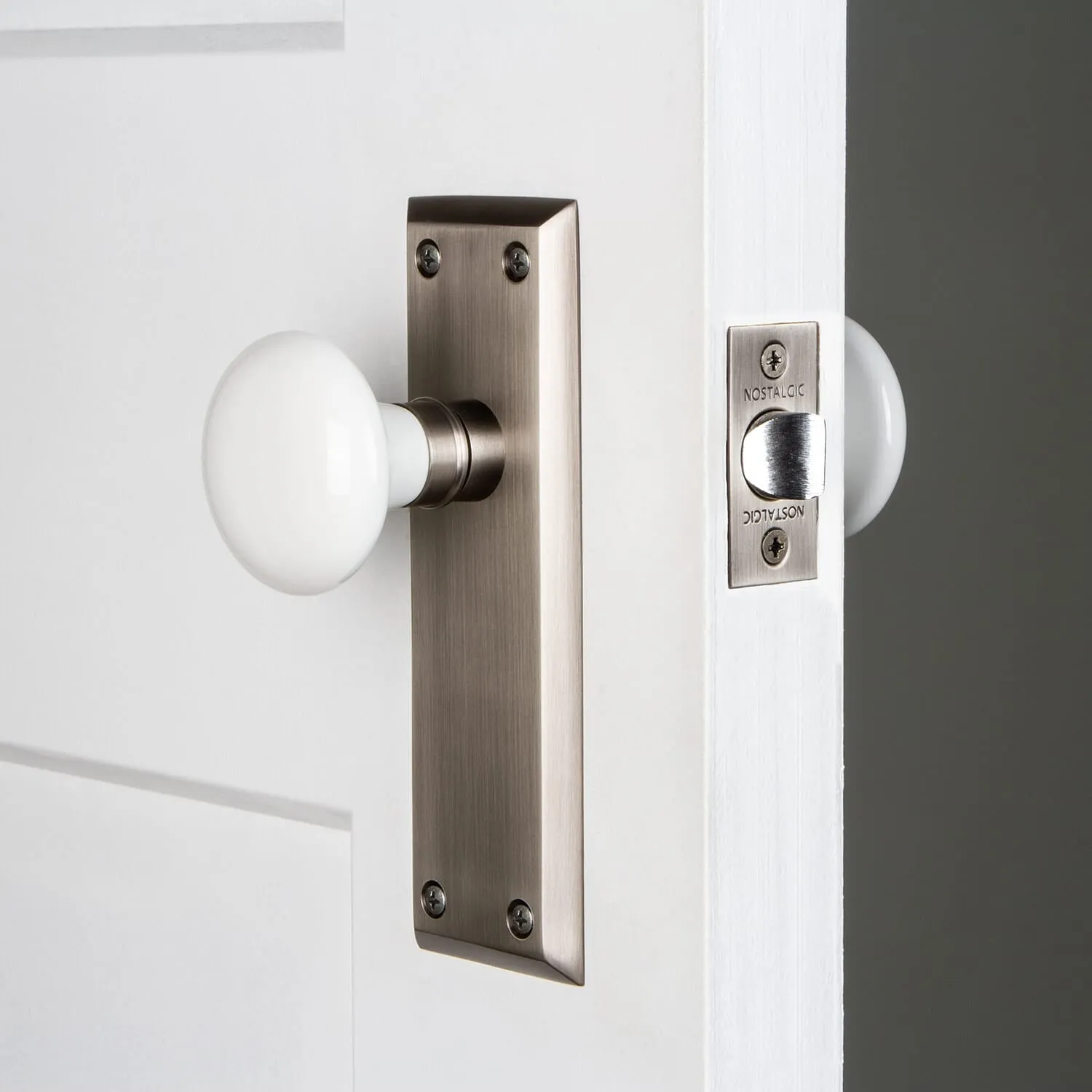 New York Long Plate with White Porcelain Knob in Antique Pewter