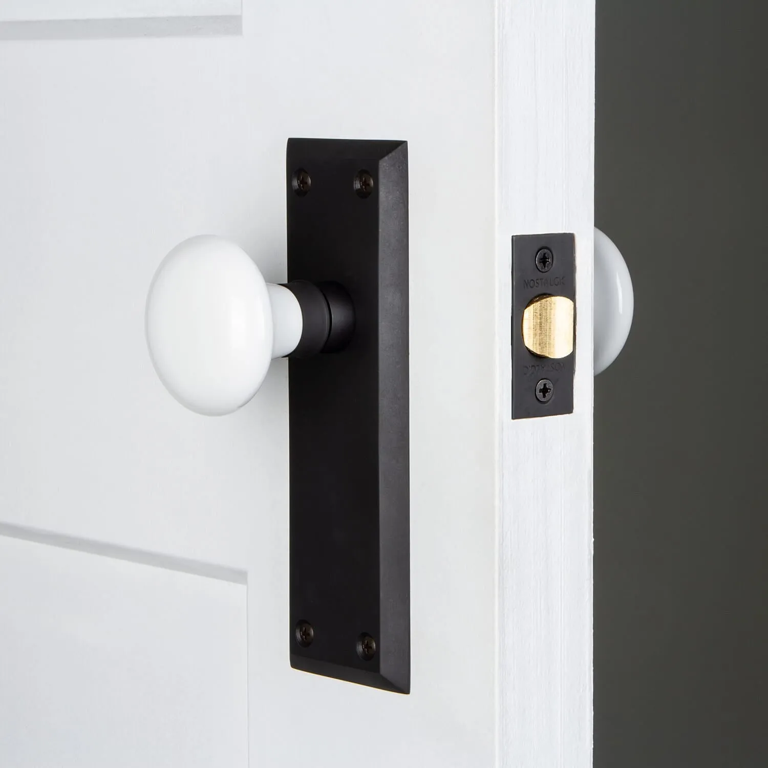 New York Long Plate with White Porcelain Knob in Oil-Rubbed Bronze